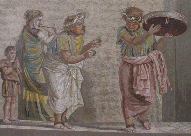 mosaico romano com cena de comédia. atores mascarados dançam ao som de percussão & sopro.